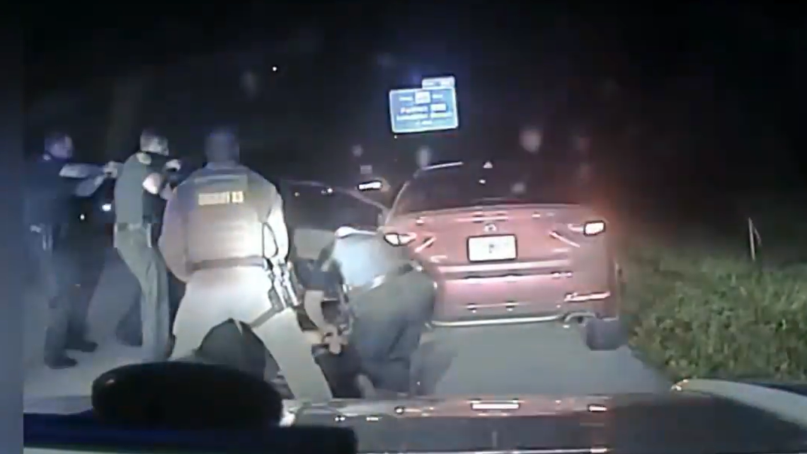 The suspect exited his car after being told a taser might be used to removed him, officials said.