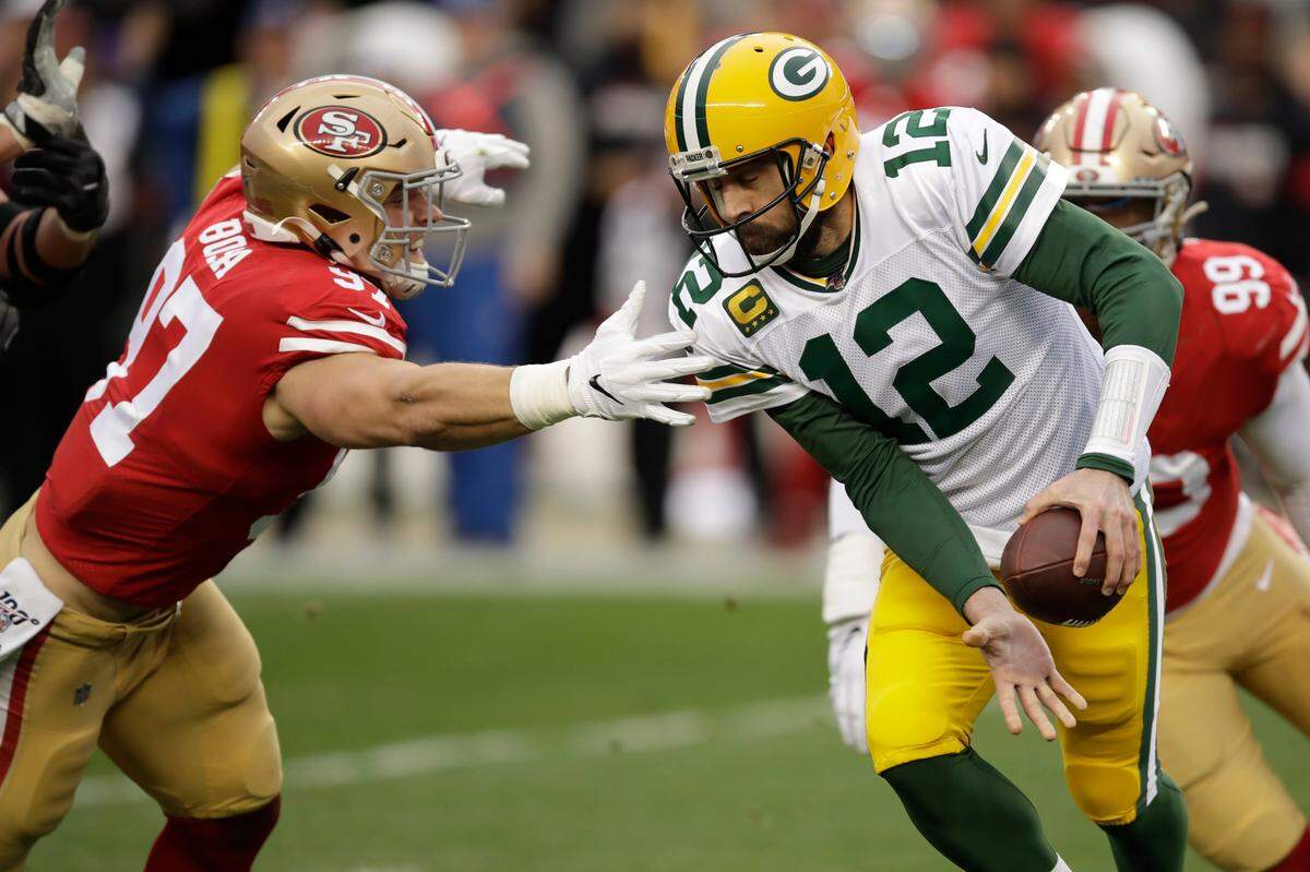 San Francisco 49ers defensive end Nick Bosa (97) sacks Green Bay Packers quarterback Aaron Rodgers (12) during the first half of the NFL NFC Championship football game Sunday, Jan. 19, 2020, in Santa Clara, Calif. (AP Photo/Ben Margot)
