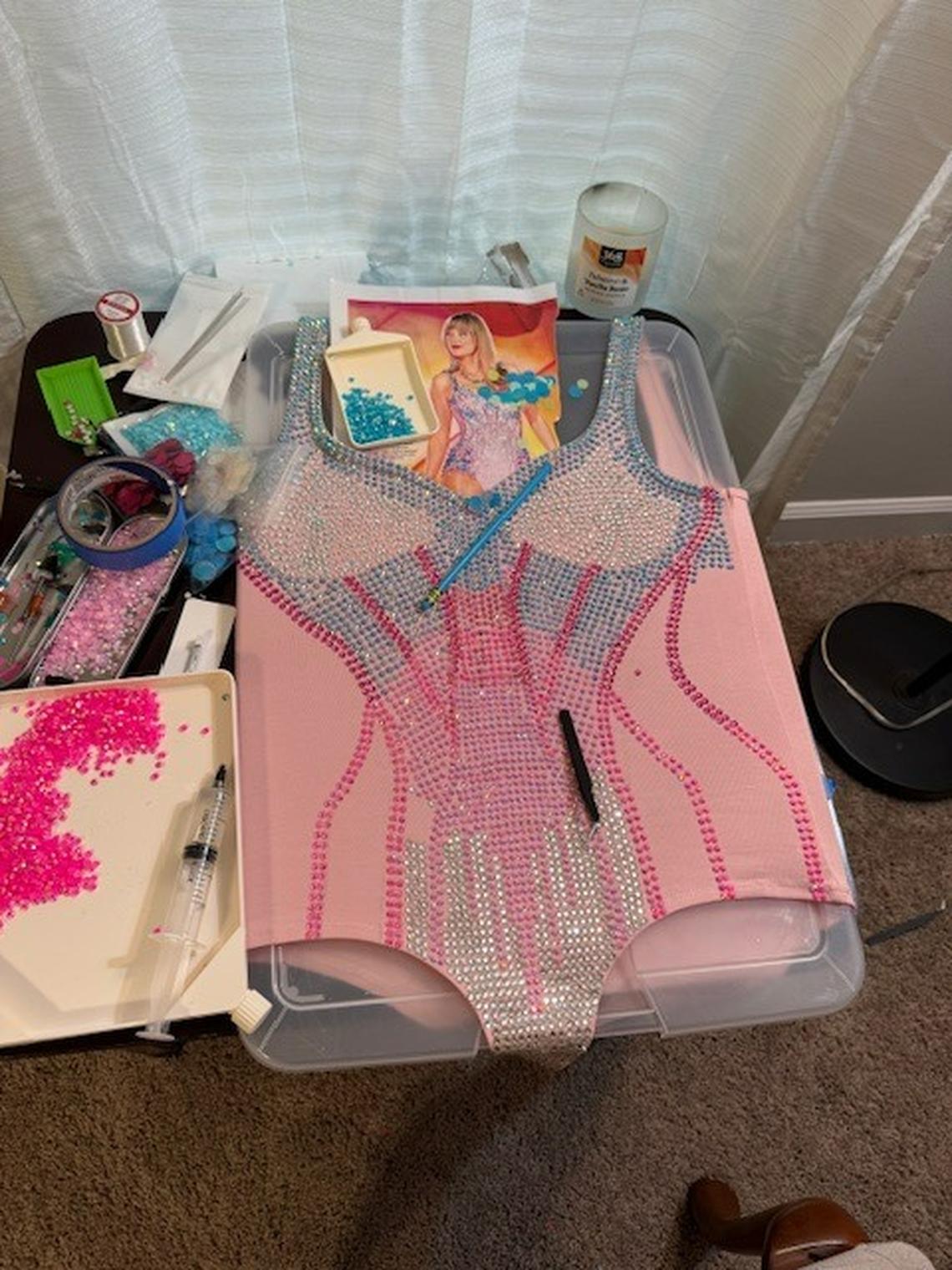 Warren Weyer of South Carolina has been bedazzling a bodysuit to surprise his girlfriend. The couple is attending the Taylor Swift concert in at The Hard Rock Stadium in Miami together.