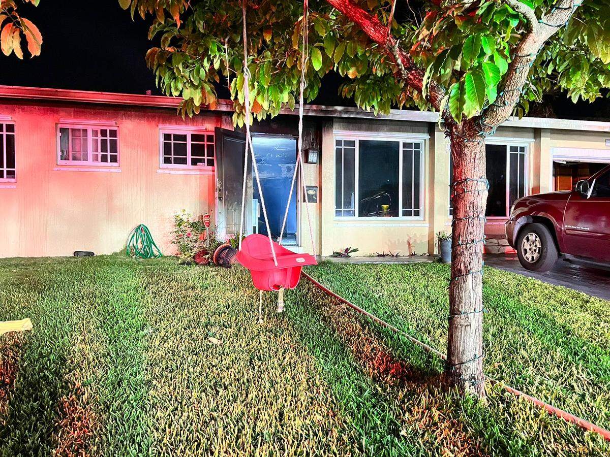 The front of the house at 8010 SW 94th Ct. after an overnight fire