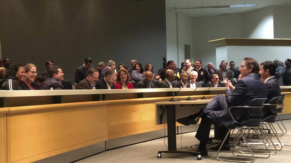 Florida Senate President Bill Galvano, second right, and House Speaker Jose Oliva, right, address lawmakers on Saturday, March 7, 2020, at the state Capitol in Tallahassee. Lawmakers from the state House and Senate are trying to reconcile a $1.4 billion gap in their respective spending proposals.