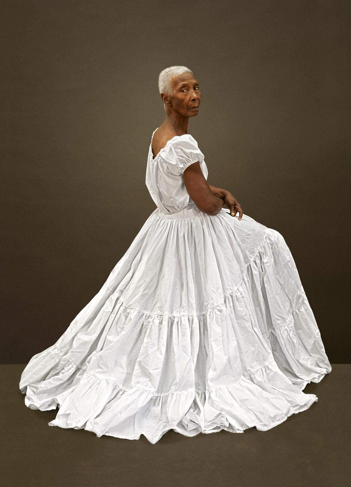 “Dominga,” one of 50 photographs of itinerant street vendors in Cartagena, Colombia by artist Ruby Rumie.