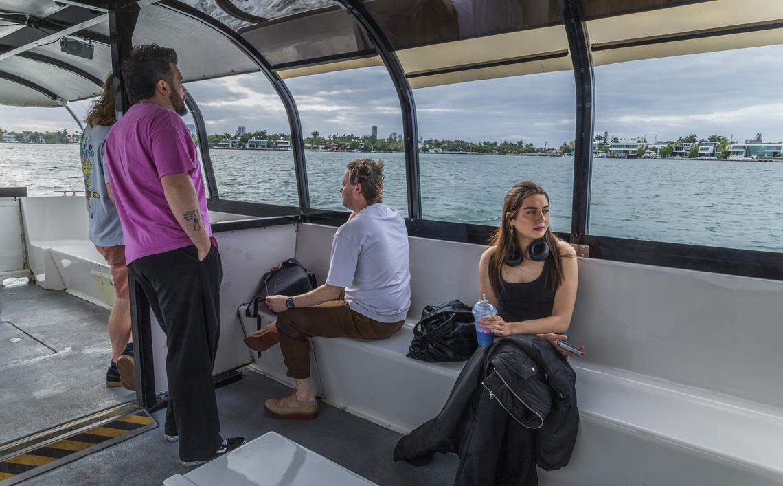 Passengers including Grace Dutton (far right) of London enjoy the ride aboard a vessel part of the free water taxi service established last January, between the Maurice Gibb Memorial Park in Miami Beach and the Venetian Marina and Yacht Club at North Bayshore Drive on the Miami side of Biscayne Bay, on Wednesday, April 15, 2026.
