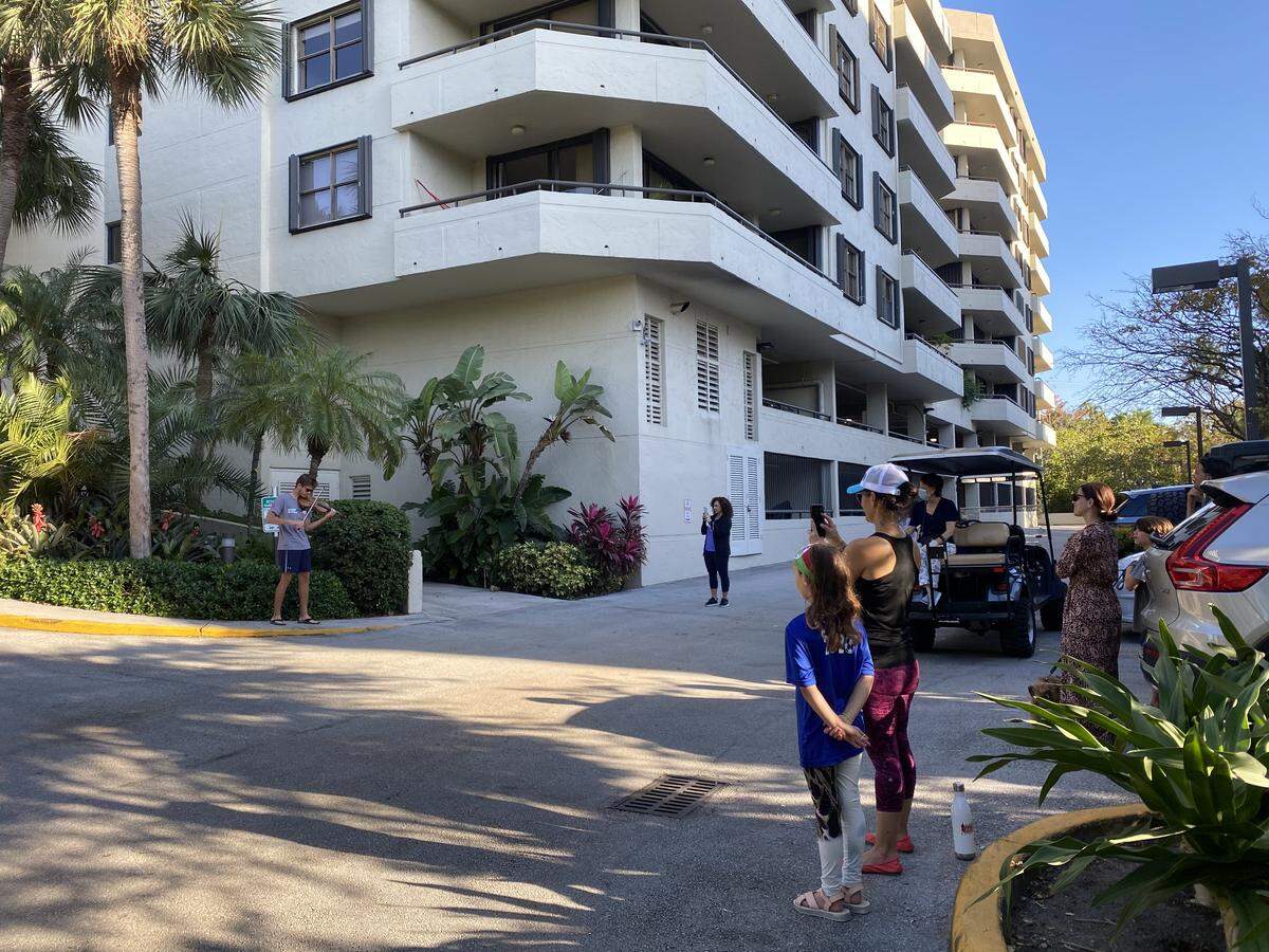At an apartment building on Key Biscayne, Zach Buttrick, 18, plays a violin concert for the residents.