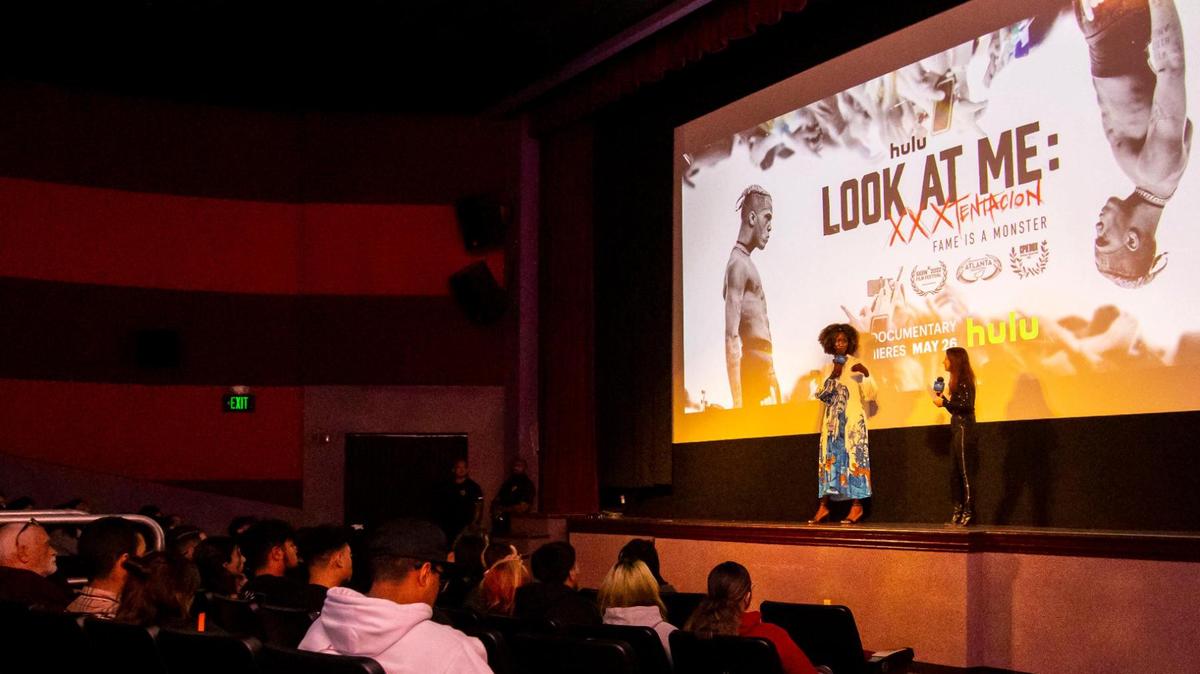 An audience listens to a Q&A session with director Sabaah Folayan and Co-Director of Programming at MDC’s Tower Theater Miami, Lauren Cohen, after the early Florida screening of the Hulu documentary “Look At Me: XXXTentacion” in Miami’s Little Havana neighborhood, on Wednesday, May 11, 2022.