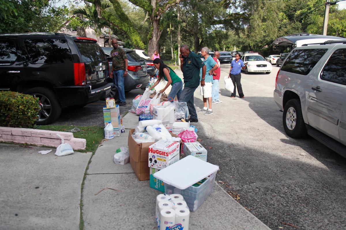 People leave off donations for Hurricane Dorian relief at Christ Episcopal Church in Coconut Grove on September 3, 2019, in Miami, Florida. The Bahamian community has more than 100-year-old roots to Coconut Grove.