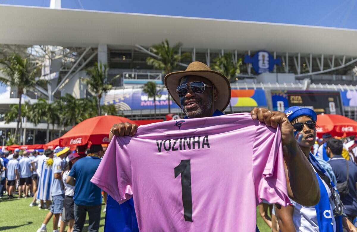 Antonio Moreira, a Cape Verde fan, holds a Cape Verde goalkeeper Vozinha (1) jersey, as he arrives to Hard Rock Stadium before his team's World Cup Group H soccer match against Uruguay on Sunday, June 21, 2026, in Miami Gardens, Fla.