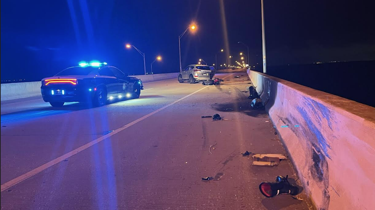 A boot is among the debris found on the Gandy Bridge after a crash sent a biker flying into Tampa Bay, photos show.
