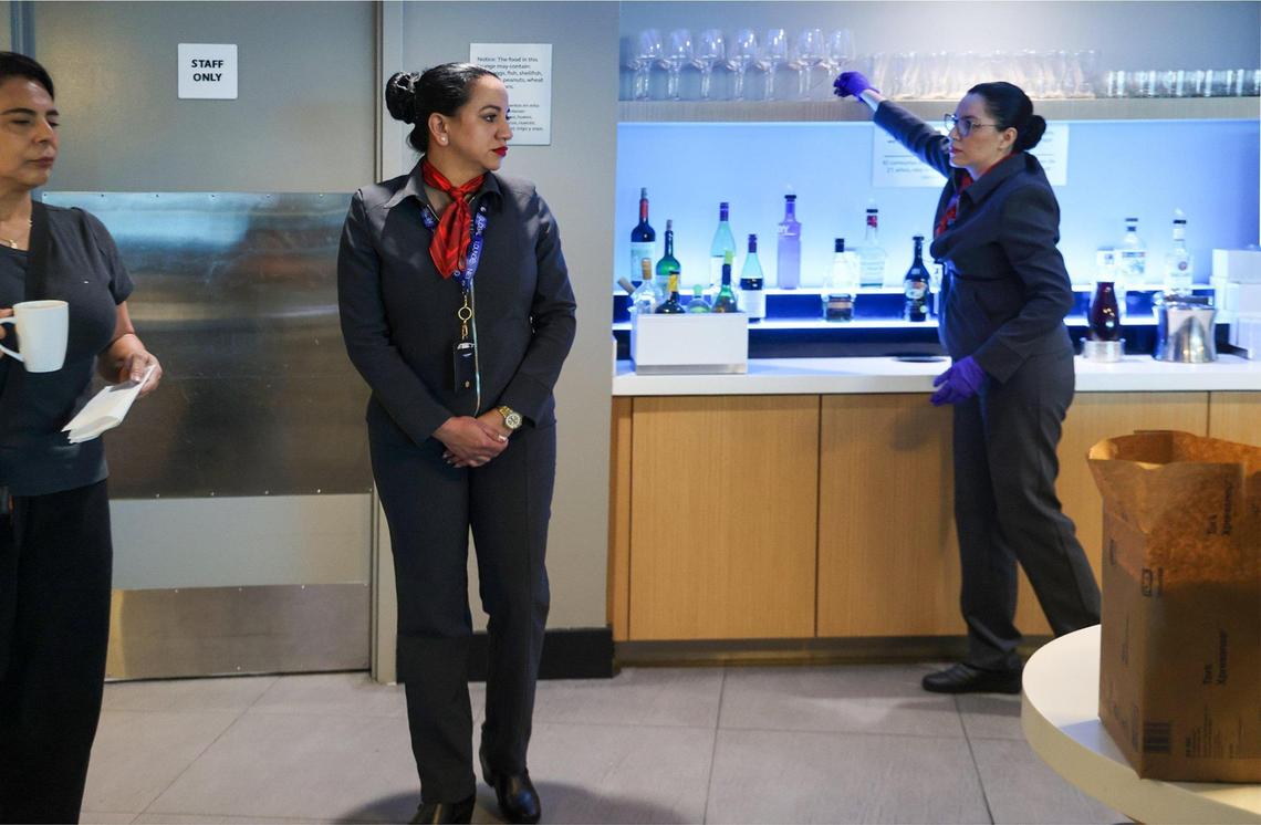 Lounge staffers host the open bar as Avianca opened a new 7,000 square foot lounge at the J Terminal in Miami, Florida. The lounge features a playroom, business center, food bar, and large windows, aimed at enhancing the travel experience for passengers on March 19, 2025, at Miami International Airport in Miami-Dade, Florida.