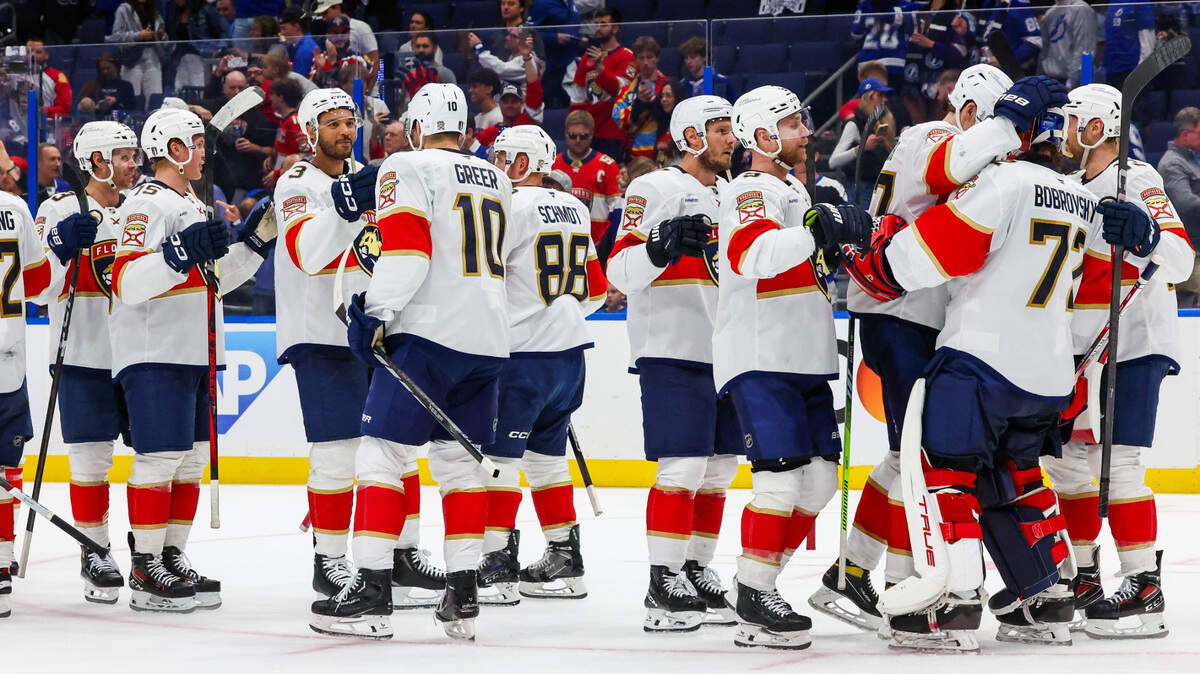 Florida Panthers players celebrate with goaltender Sergei Bobrovsky (72) after defeating the Tampa Bay Lightning 6-3 in game 5 of the first round of the Stanley Cup Playoffs set Amalie Arena on Wednesday, April 30, 2025, in Tampa.