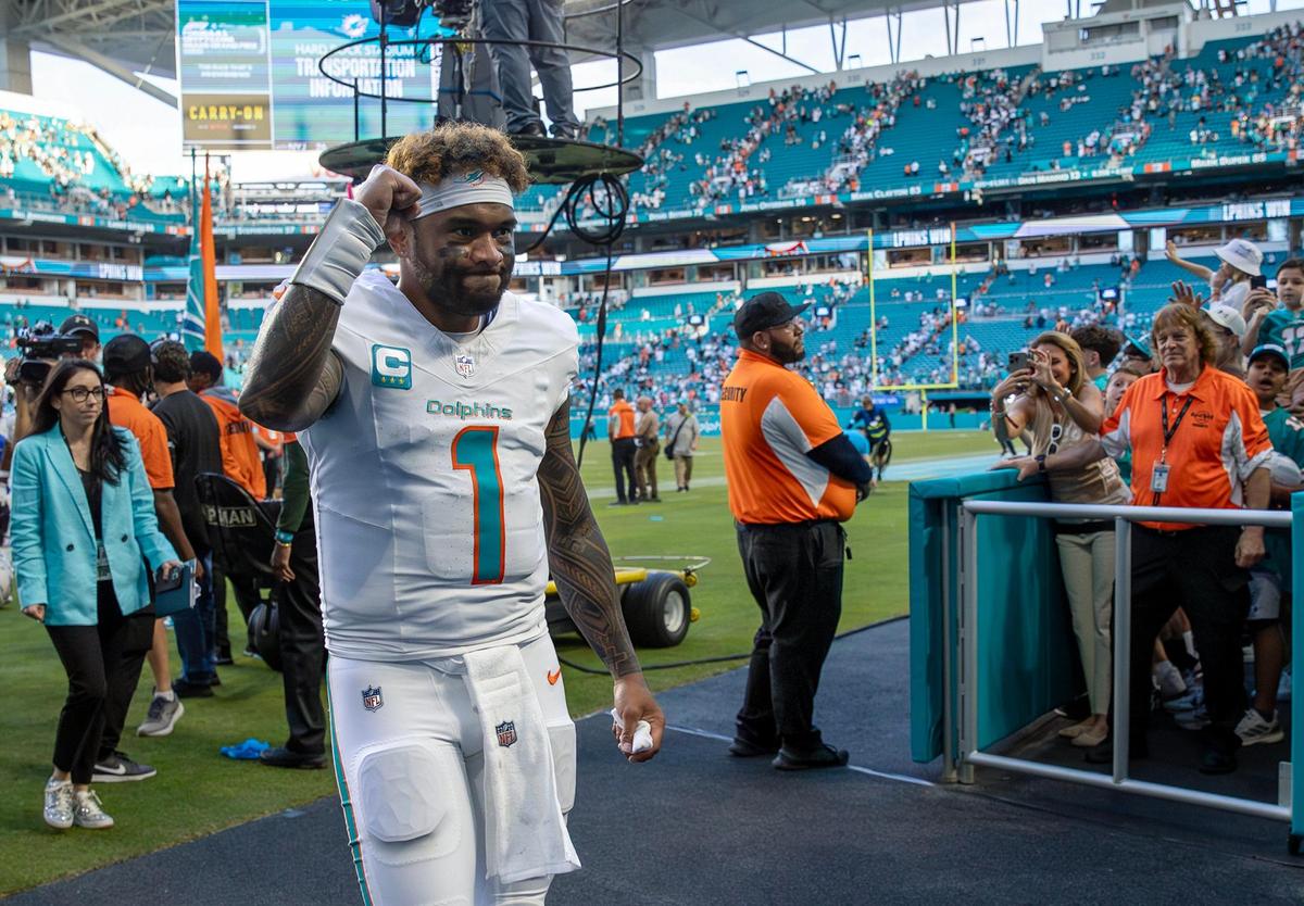 Miami Dolphins quarterback Tua Tagovailoa (1) exits the field following a 32-26 overtime victory against the New York Jets in their NFL matchup at Hard Rock Stadium on Sunday, Dec. 8, 2024, in Miami Gardens, Florida.