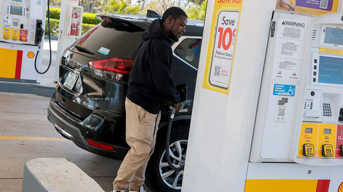 Derik Brown fills his vehicle with fuel at a gas station on April 13, 2026, in Miami, Florida. Due largely to the war in Iran, energy prices rose 3.9% in May alone and have climbed nearly 24% over the last 12 months.