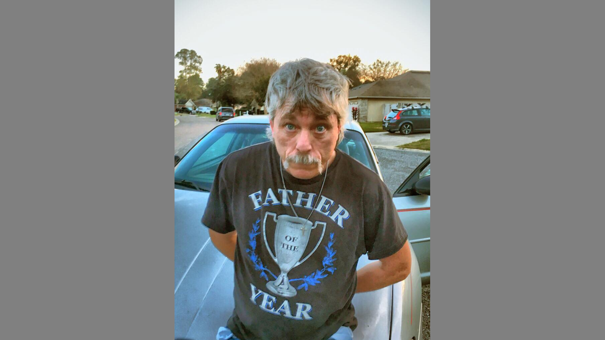 Clarence Sheese, an Ohio fugitive, was charged with child sex crimes after the Clay County Sheriff’s Office in Florida said it arrested the man, who was wearing a ‘Father of the Year’ T-shirt, on Tuesday.