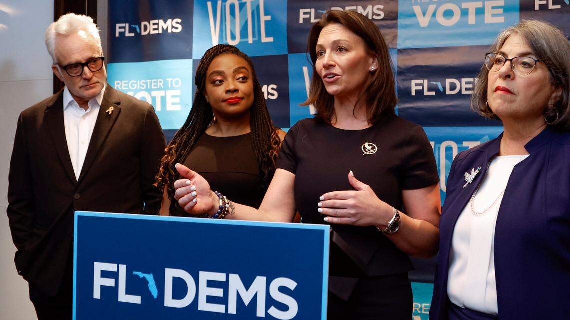 Florida Democratic Chair, Nikki Fried speaks to reporters during presser at the Florida Democratic Party’s Annual Leadership Blue Weekend at the Fontainebleau Hotel on Miami Beach, Florida, on Saturday, July 8, 2023. Joining her at the podium is Actor and Producer Bradley Whitford, Florida State Representative Dotie Joseph and Miami-Dade Mayor Daniella Levine Cava, left to right.