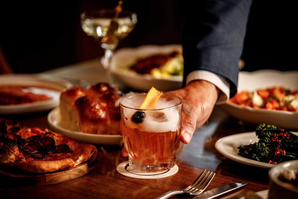 A smoked old fashioned at the bar at Old Cutler Inn in Palmetto Bay.