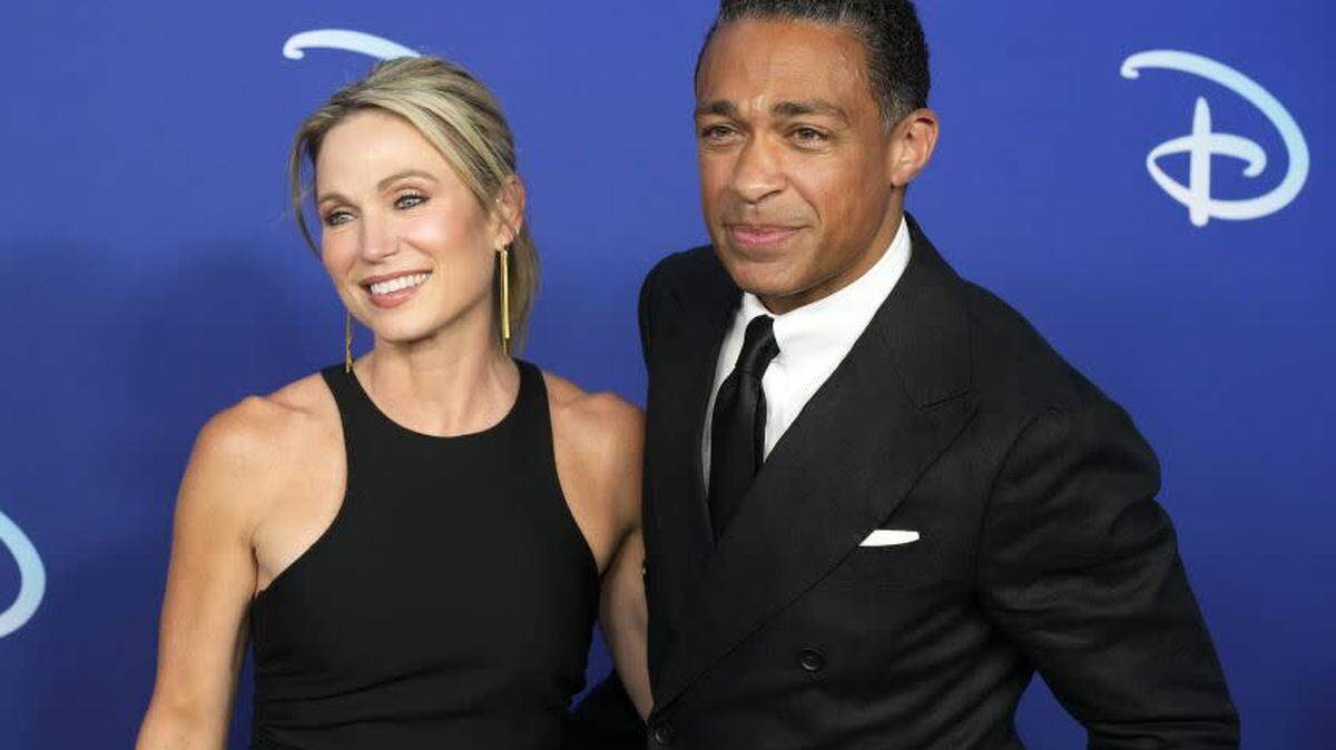 Amy Robach and T. J. Holmes attend the Disney 2022 Upfront presentation in New York last May. (Charles Sykes / Invision / Associated Press)