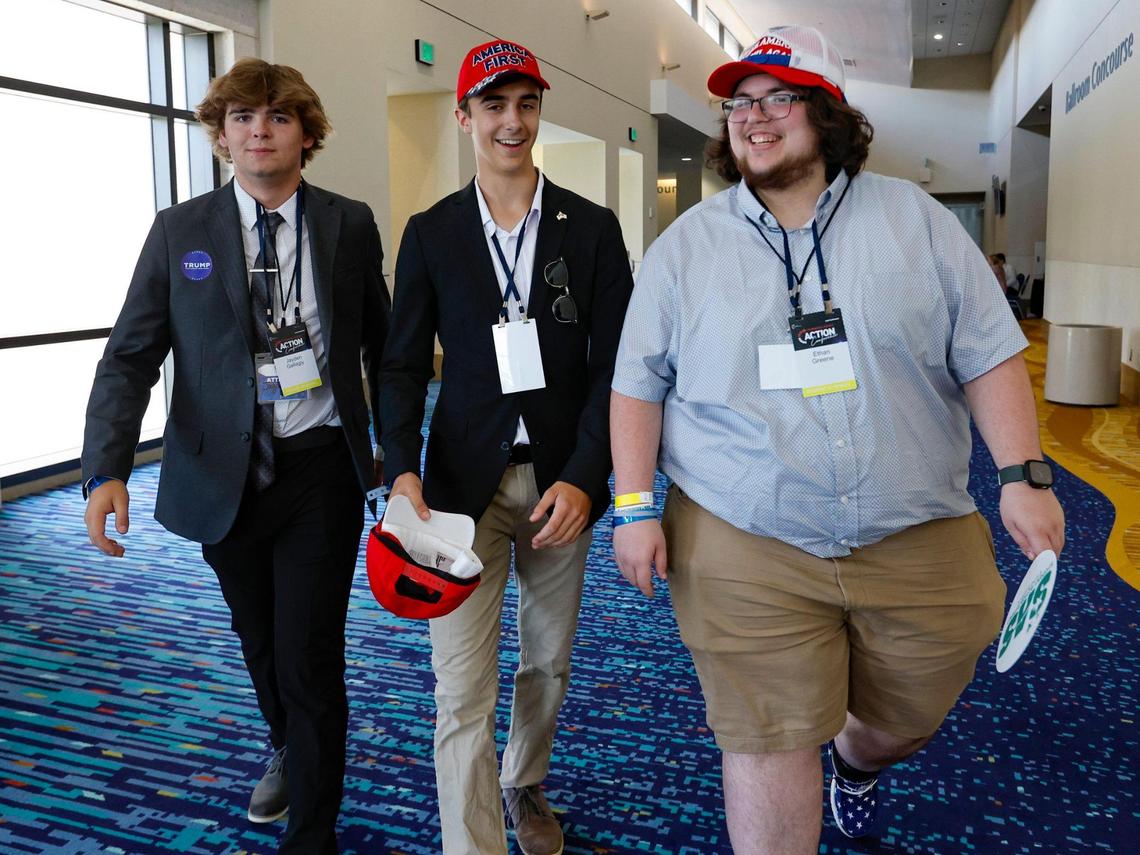 Jayden Gallagly, Zachary Workinger, and Ethan Greene walk the halls during the Turning Point Action Conference at the Palm Beach County Convention Center in West Palm Beach, Florida, on Saturday, July 15, 2023.