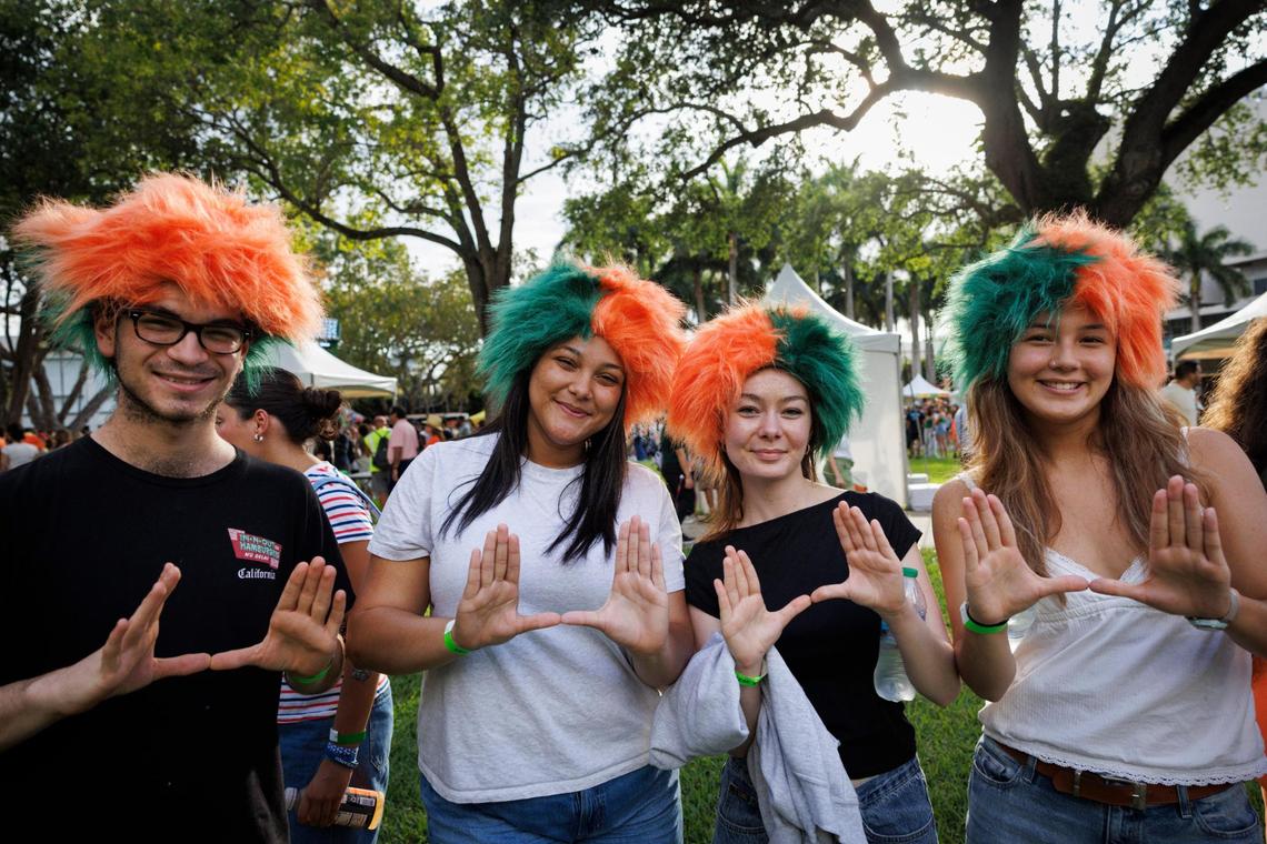 A group of sophomore friends hold up the U during the University of Miami Centennial celebration on Tuesday, April 8, 2025, on Foote University Green at the University of Miami’s Coral Gables campus.