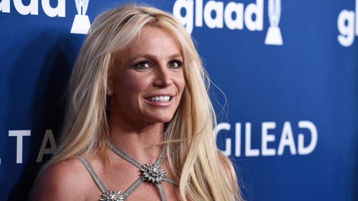 Britney Spears arrives at the 29th annual GLAAD Media Awards on April 12, 2018, in Beverly Hills, California. A judge ruled Wednesday to allow her to hire her own lawyer in the battle of her conservatorship. (Photo by Chris Pizzello/Invision/AP, File)