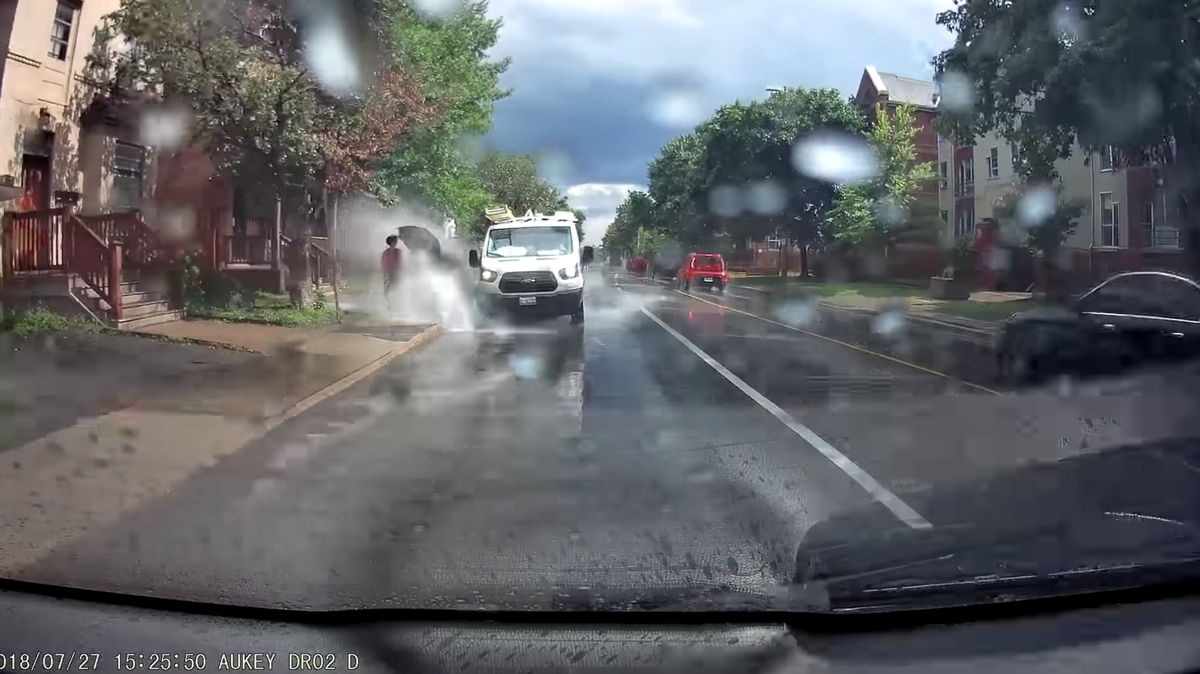A video shows a van owned by Black & McDonald Limited, a company out of Toronto, Canada, appearing to swerve purposefully in puddles to soak those walking by. The company said it fired the driver, and police said they will file no charges.
