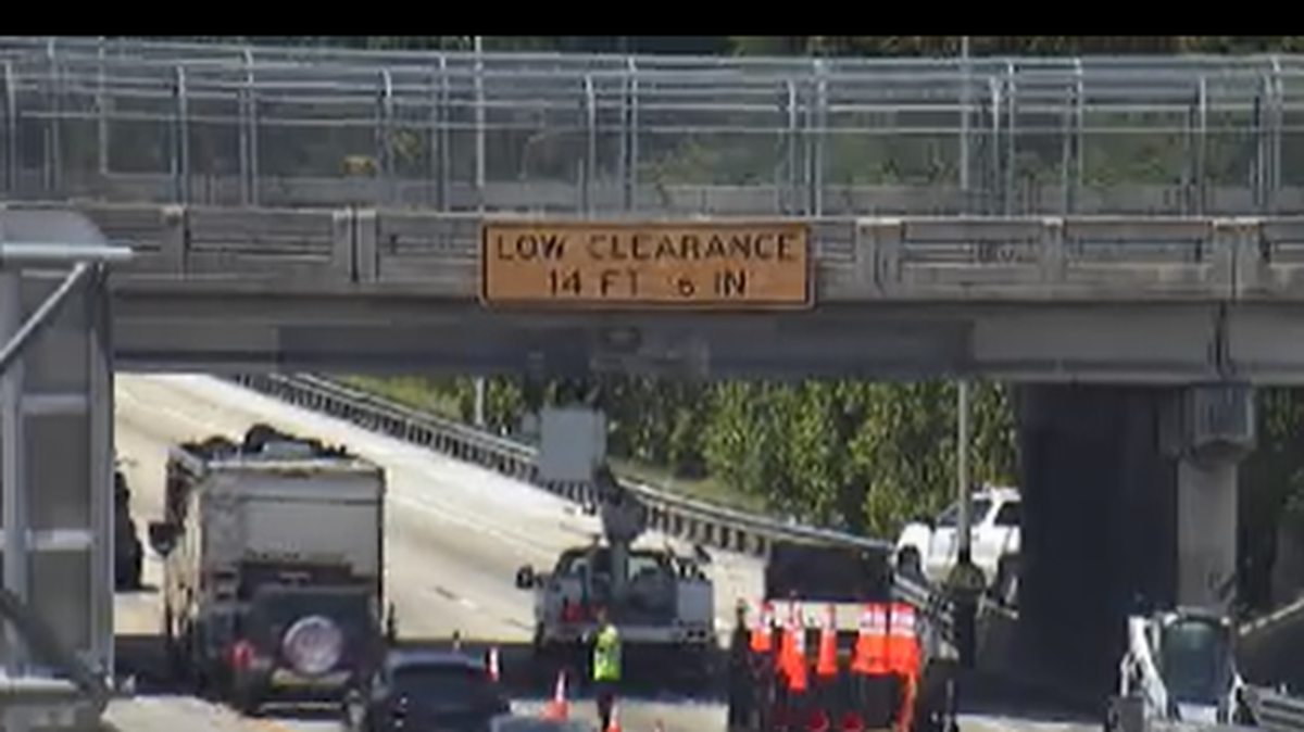 A truck stuck the Sheridan Street overpass at Florida’s Turnpike in Hollywood causing road closures and delays in the early afternoon of Monday, April 25, 2022.