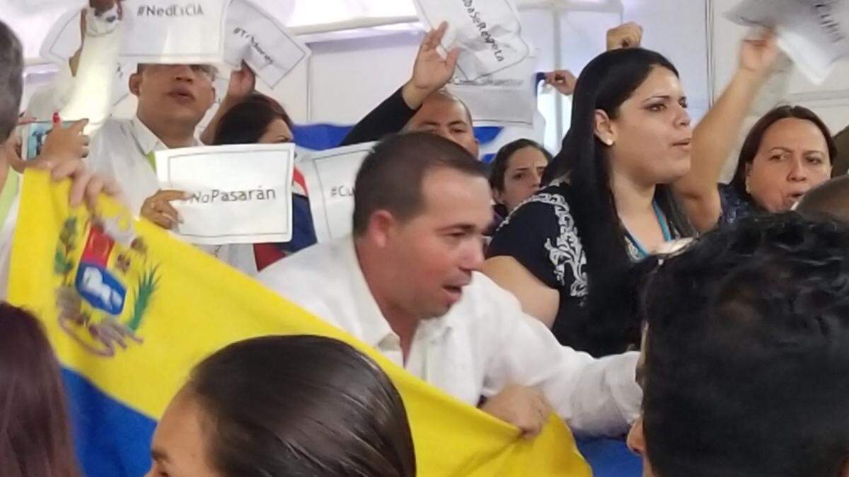 Cuban delegation, joined by members of the Venezuelan delegation, interrupted Thursday's final session of a civil society conference taking place alongside the VIII Summit of the Americas in Lima, Peru.