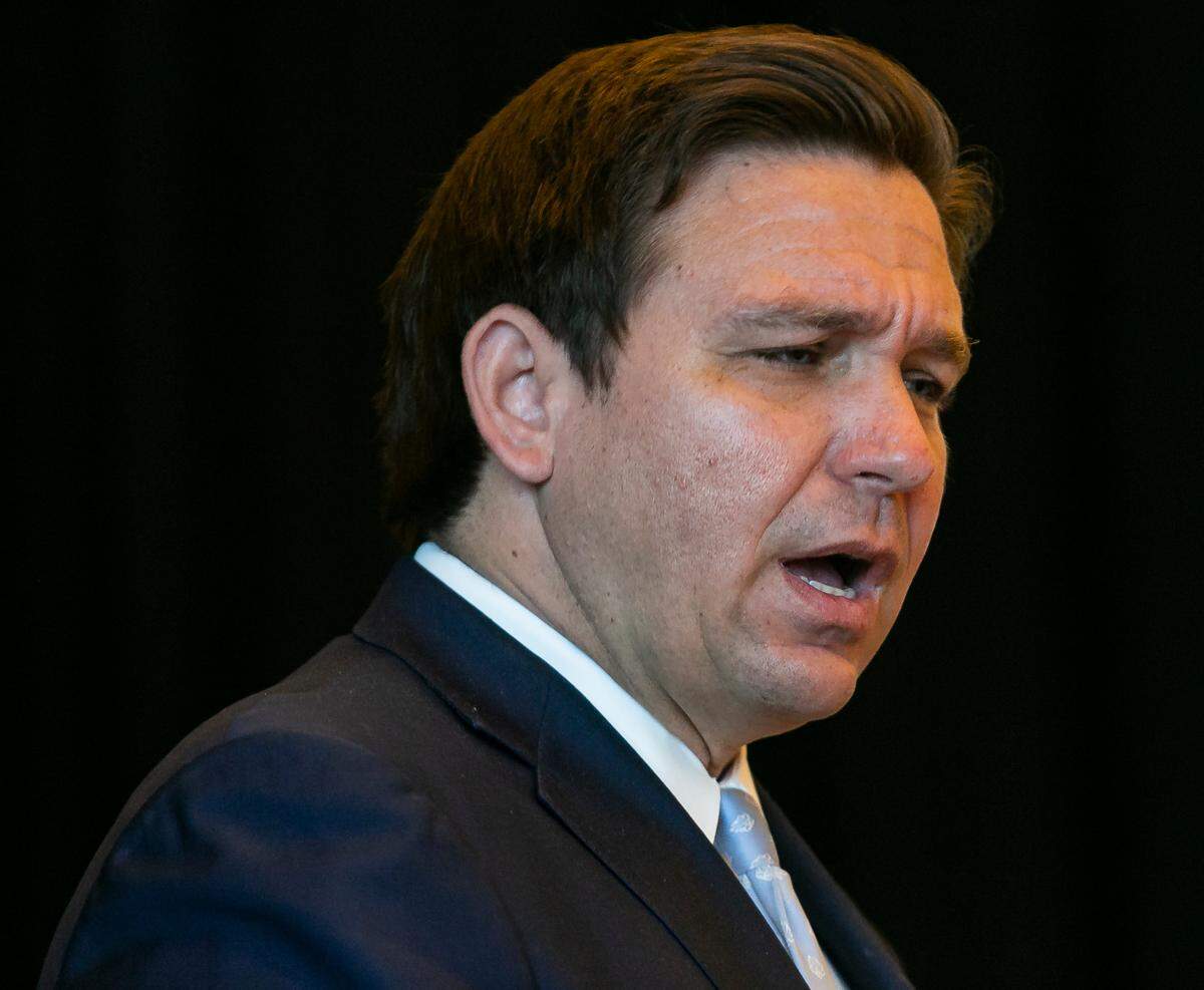Florida Governor Ron DeSantis speaks during a press conference at the Hard Rock Stadium in Miami Gardens on Monday, August 24, 2020. He discussed a state order preempting local rules on sporting events, which lets Miami-Dade County allow fans at some games.