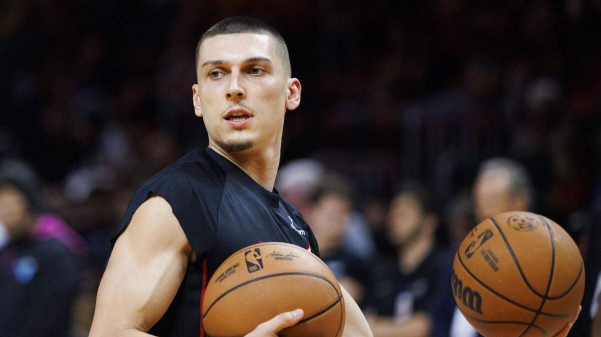 Miami Heat guard Tyler Herro (14) warms up before the first half of a game against the Dallas Mavericks on Monday, Nov. 24, 2025, at the Kaseya Center in downtown Miami, Fla.