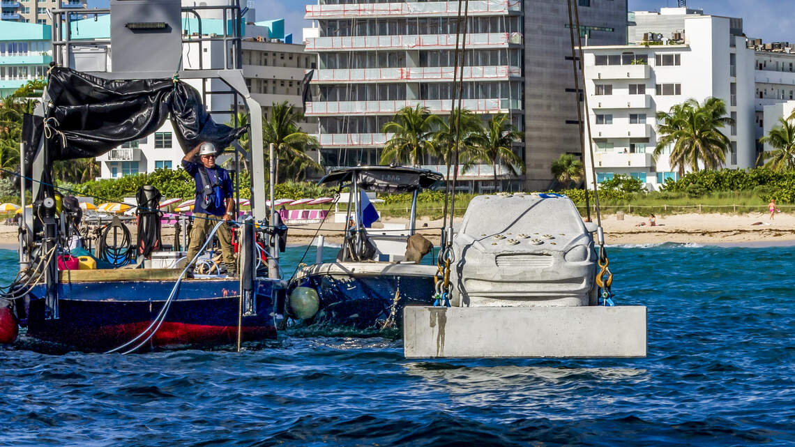 Miami Beach’s unique new attraction: A traffic jam, underwater, of concrete cars