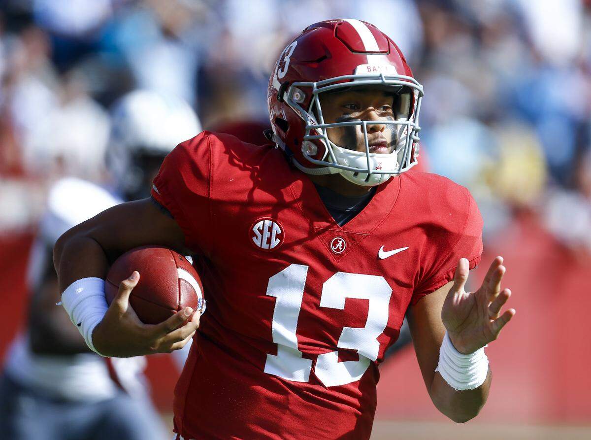 Alabama dual-threat quarterback Tua Tagovailoa, shown carrying the ball late in the 2018 season, is expected to be the overall No. 1 pick in the 2020 NFL Draft. 