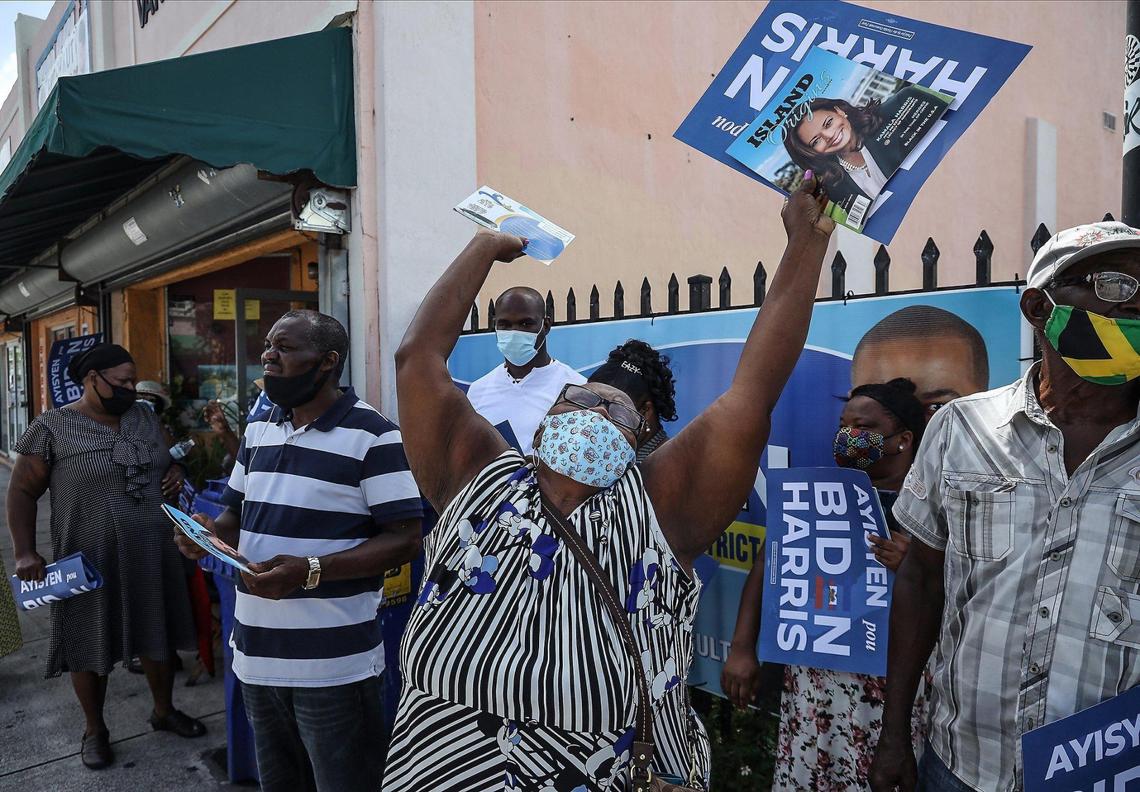 Haitian-American supporters of Democratic presidential nominee Joe Biden lined the streets of Northeast Second Avenue and 59th Street in Little Haiti hoping to catch a glimpse of the candidate as he arrived at the Little Haiti Cultural Center on Oct. 5, 2020. Biden courted Haitian-American leaders and voters on the last day to register to vote in Florida for the Nov. 3 presidential election.