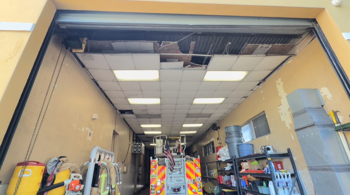 A snapshot of Miami’s Fire Station 10 shows missing ceiling tiles above the area where a fire truck is stored.
