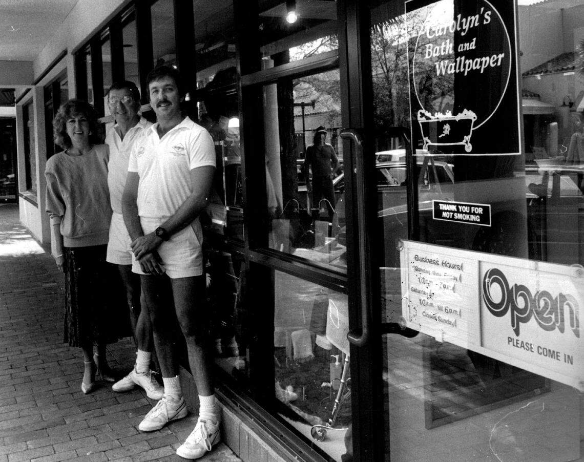Carolyn, Chuck and Ponz outside their shop on Main Street in 1987.