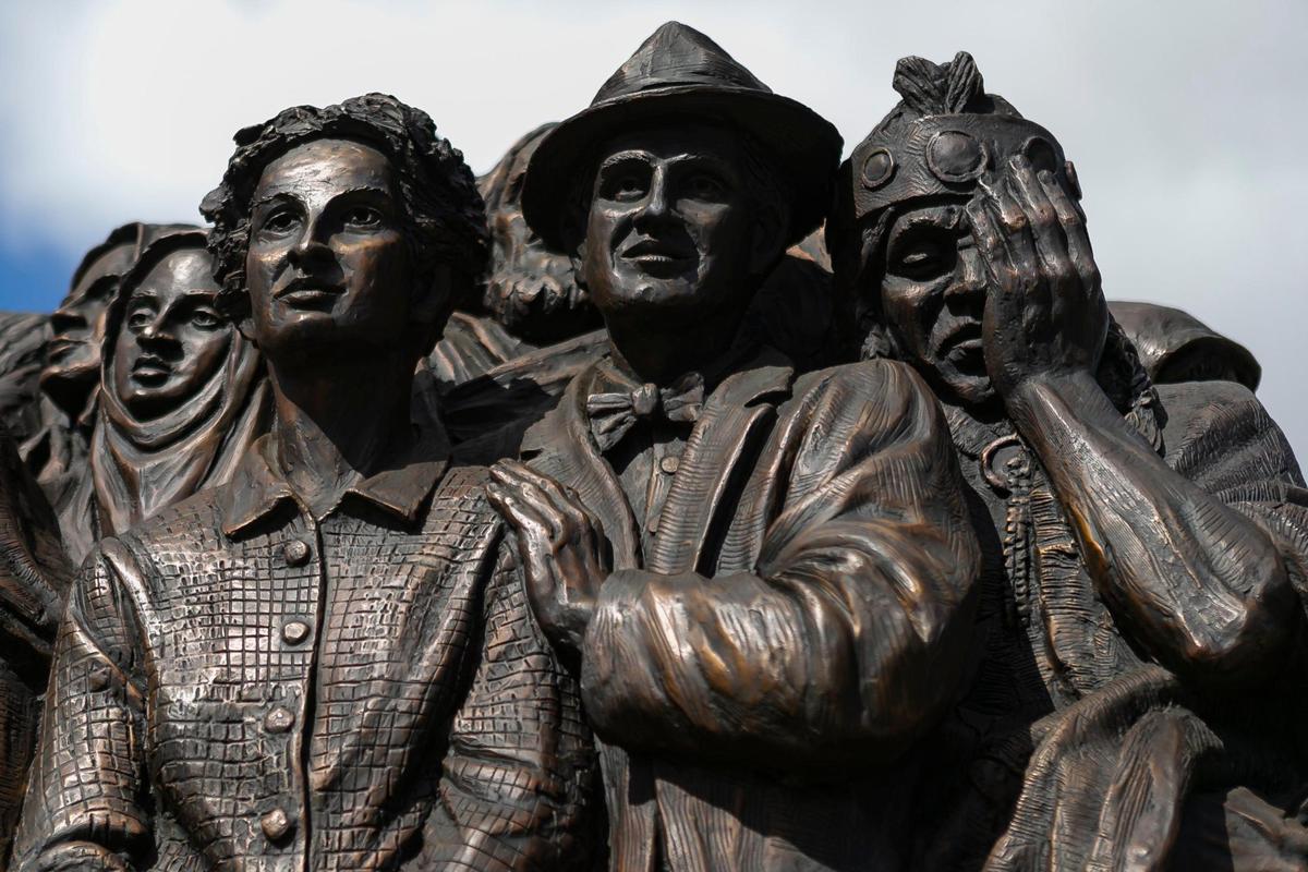 The traveling bronze sculpture titled “Angels Unawares,” is on display at Bayfront Park in downtown Miami on Wednesday, February 10, 2021. The life-sized sculpture will be open to the public daily for viewing until April 8. The sculpture weighs four tons and is 20-feet long. It features indigenous people, Jews fleeing Nazi Germany, Joseph, Mary, Jesus, and much more.