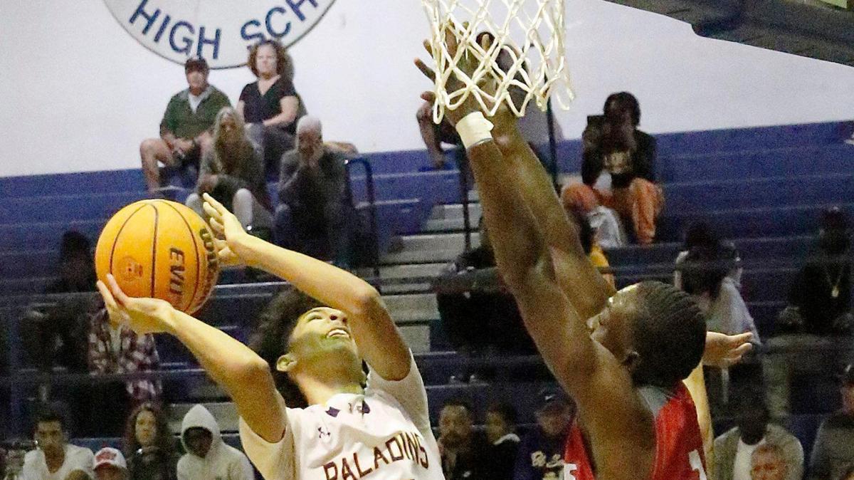 South Plantation Paladins Dwight Stephens (25) goes for a shot during the BCAA Boys Big 8 2023 Basketball championship game against Cardinal Gibbons Chiefs on Saturday at Fort Lauderdale High.