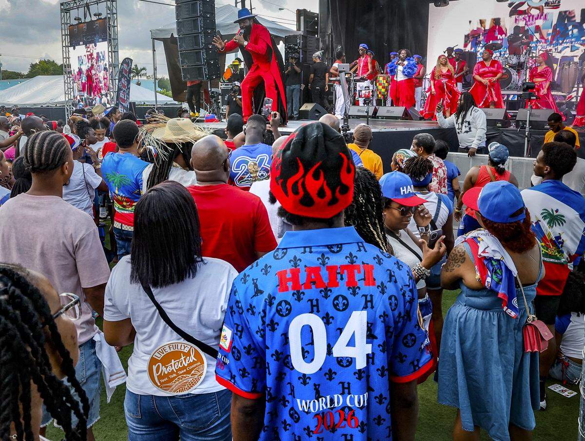 The crowd watches a performer during the 28th Annual Haitian Compas Festival at The NoMI Village celebrating Haitian Flag Day, in North Miami, Florida  on Saturday, May 16, 2026.