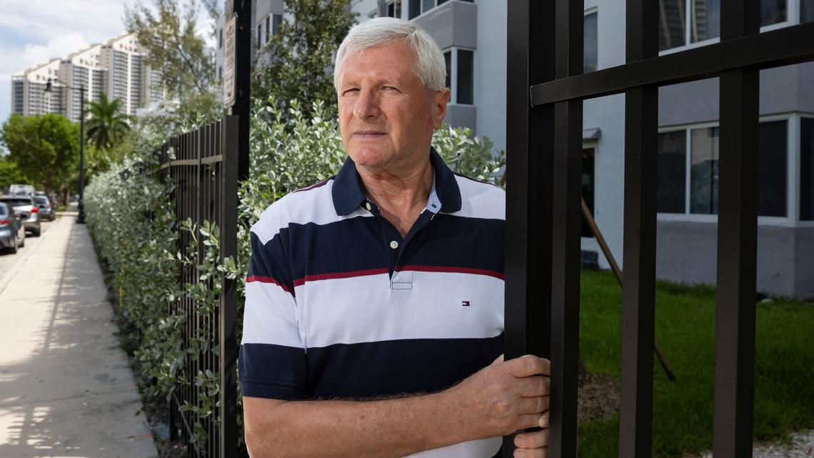 Arkadiy Kats, 71, is photographed outside of the Caribbean Breeze Condominium on Monday, July 29, 2024, in Sunny Isles Beach. Kats pays $887 in homeowners association fees and $340 in special assessment fees monthly as a resident of the condominium.
