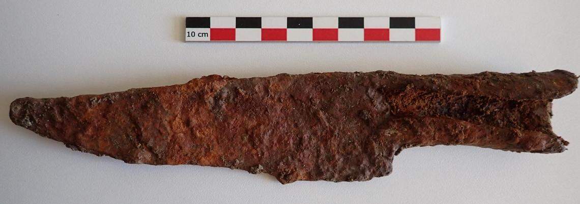 A complete iron knife found at the site.