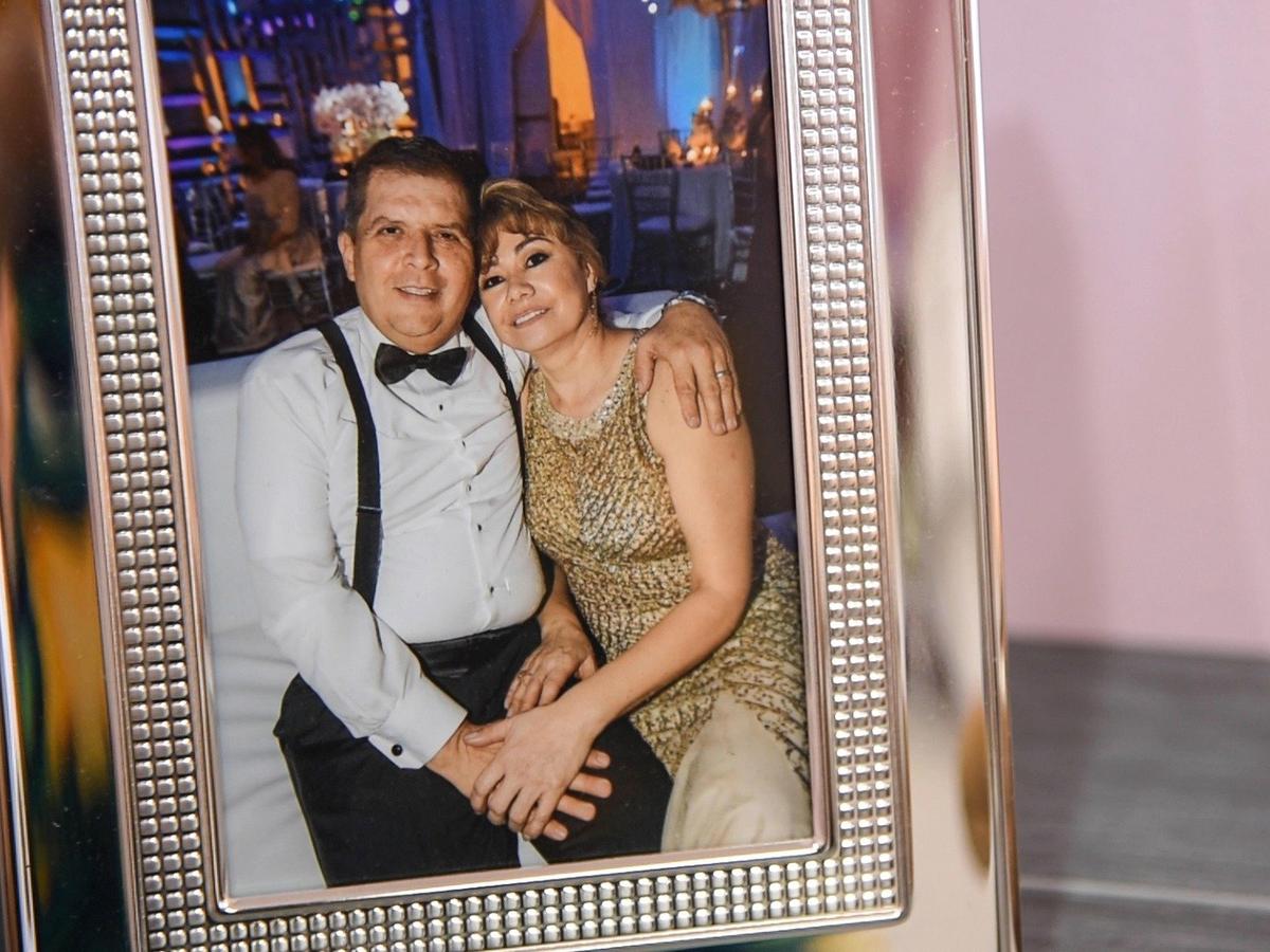 A portrait of Maria Luisa Jiménez and her late husband, Ricardo Jiménez, adorns the office of faja purveyor Premier International Group. The couple founded the company that sells and distributes shapewear.