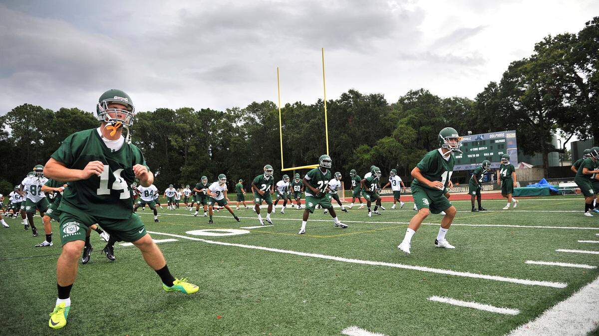 This is an Aug. 7, 2012, file photo showing Jacksonville University holding its first football practice of the season, in Jacksonville, Fla. Jacksonville University has decided to discontinue its football program. The school made the announcement Tuesday, Dec. 3, 2019, saying it spent more than a year evaluating its athletic department and exploring ways to position itself for long-term growth and success.