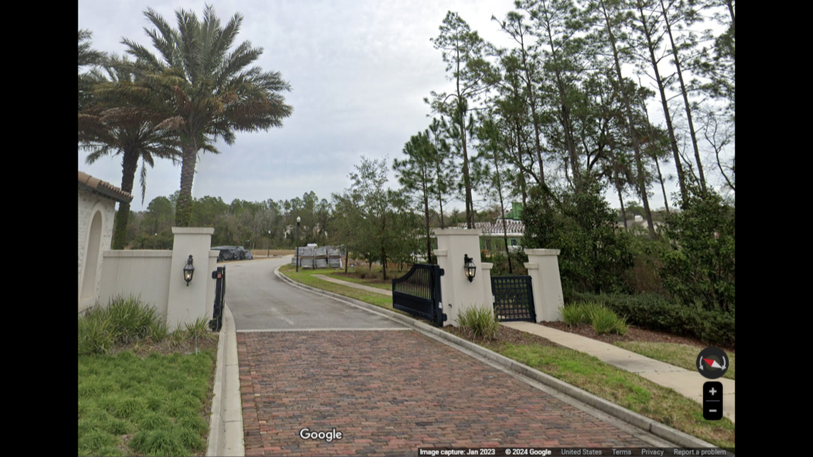 Construction materials and an unfinished home peak through the trees at the front of Nacotee’s Vista neighborhood, where a custom home builder is accused of collecting deposits then abandoning the projects, a Florida sheriff’s office said.