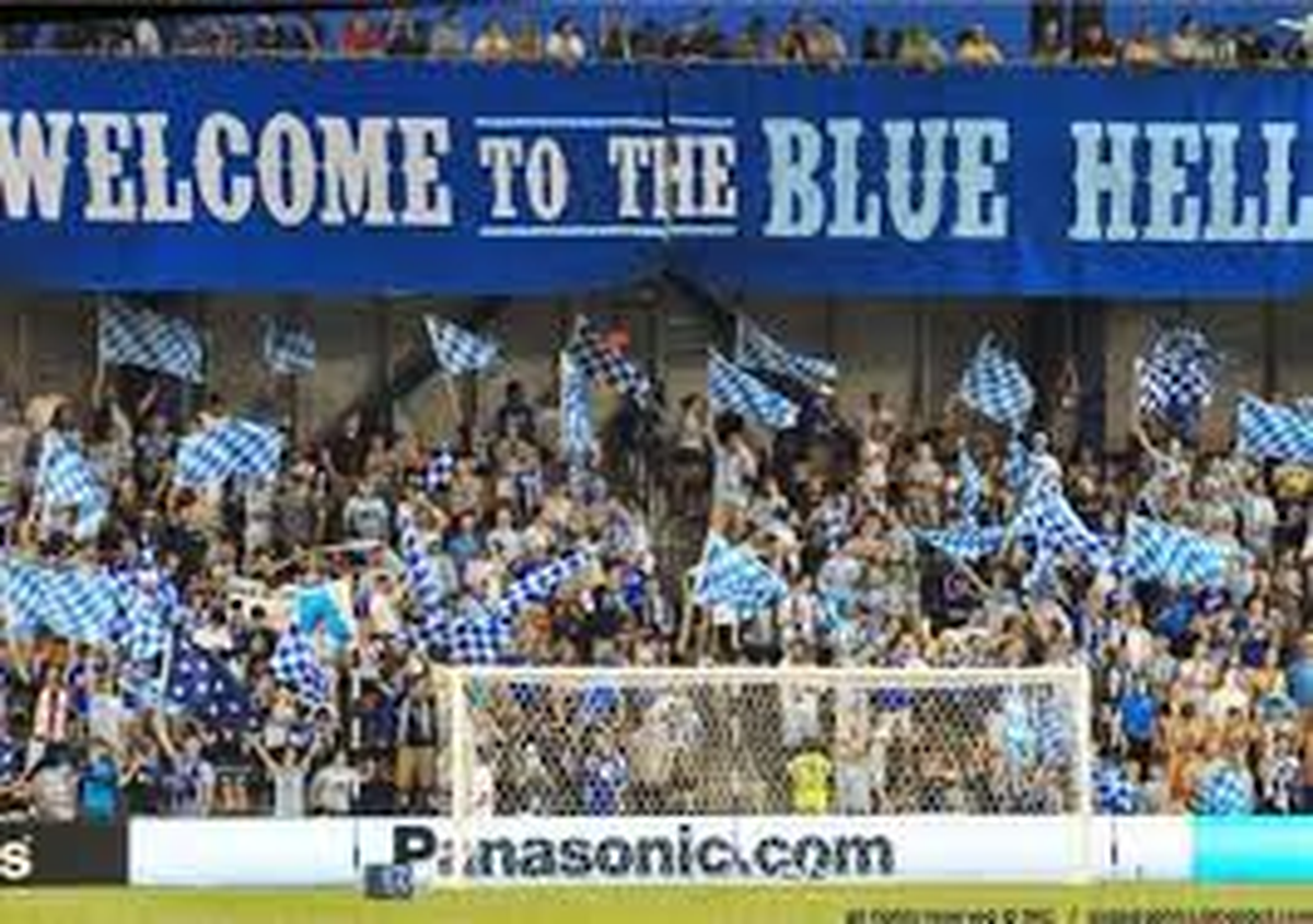 Sporting KC fans gather in “The Cauldron” to support their team.