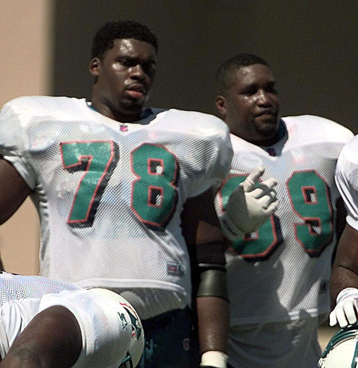 FOR SPORTS SPECIAL SECTION 8/12/97 PHOTO BY JOE RIMKUS JR MHS At Dolphins Training Camp at Nova Southeastern University in Davie.Richmond Webb and Keith Sims during practice.