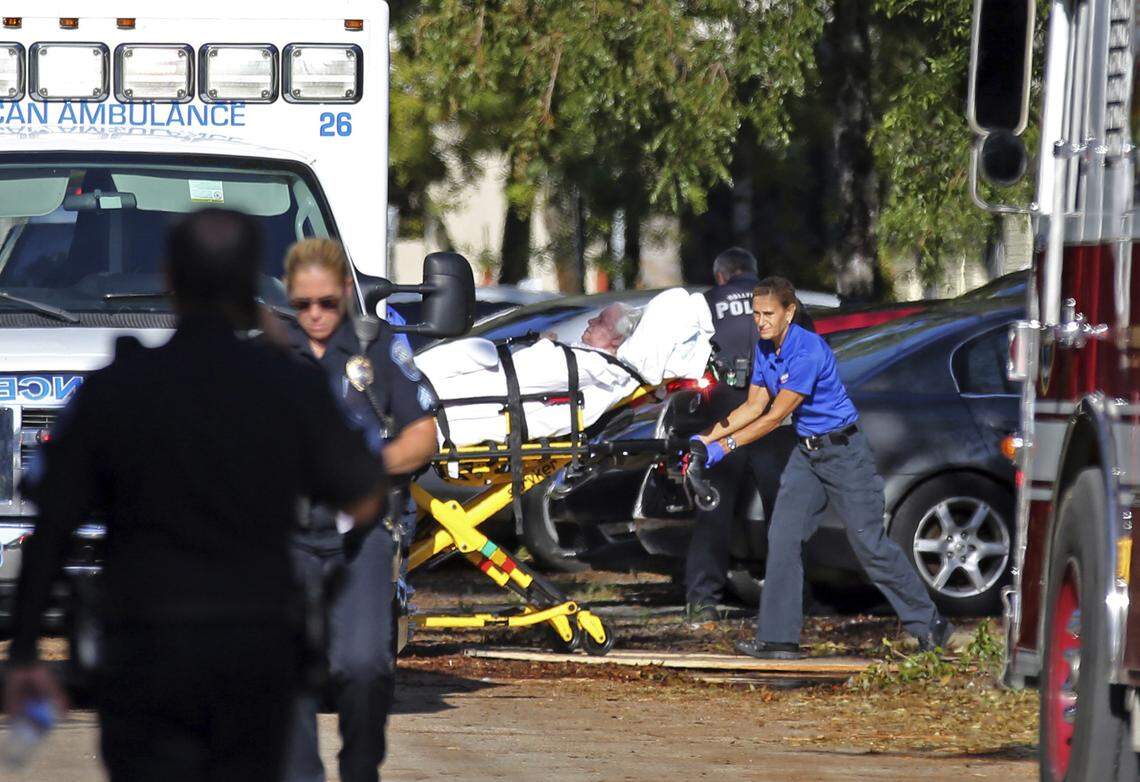 A file photo shows a woman being transported from The Rehabilitation Center at Hollywood Hills as patients were evacuated after a loss of air conditioning due to Hurricane Irma on Wednesday, Sept. 13, 2017, in Hollywood.