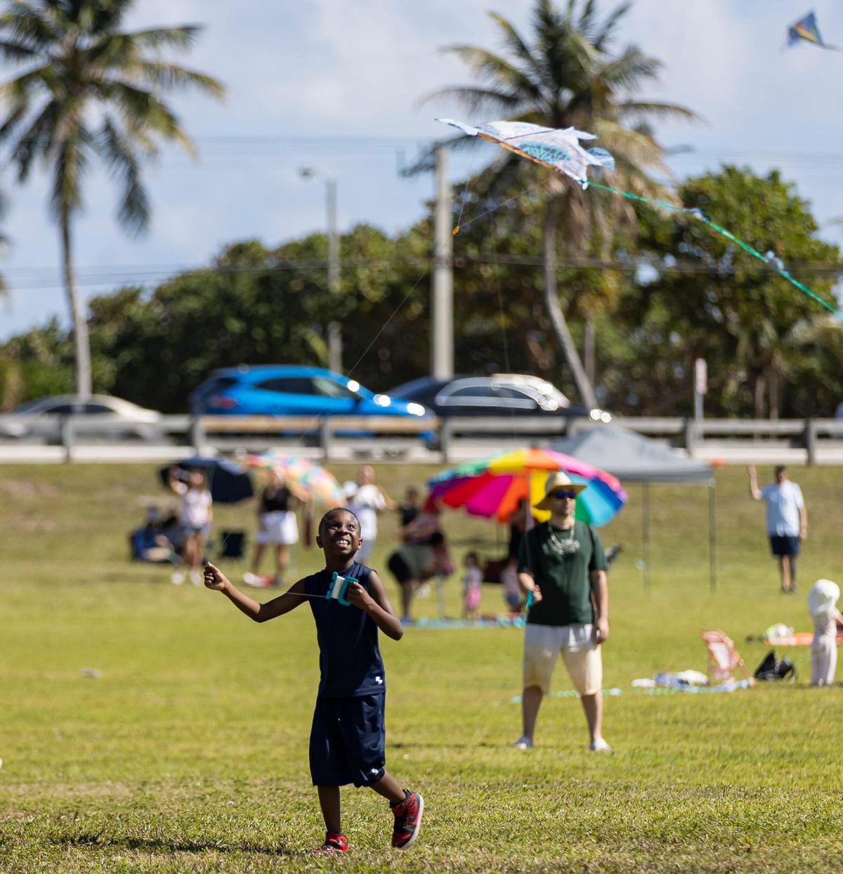 Solomon Scott, 8, flies his kite during the 33rd Annual Kite Festival in Northeast Miami-Dade on Saturday, Feb. 15, 2025.