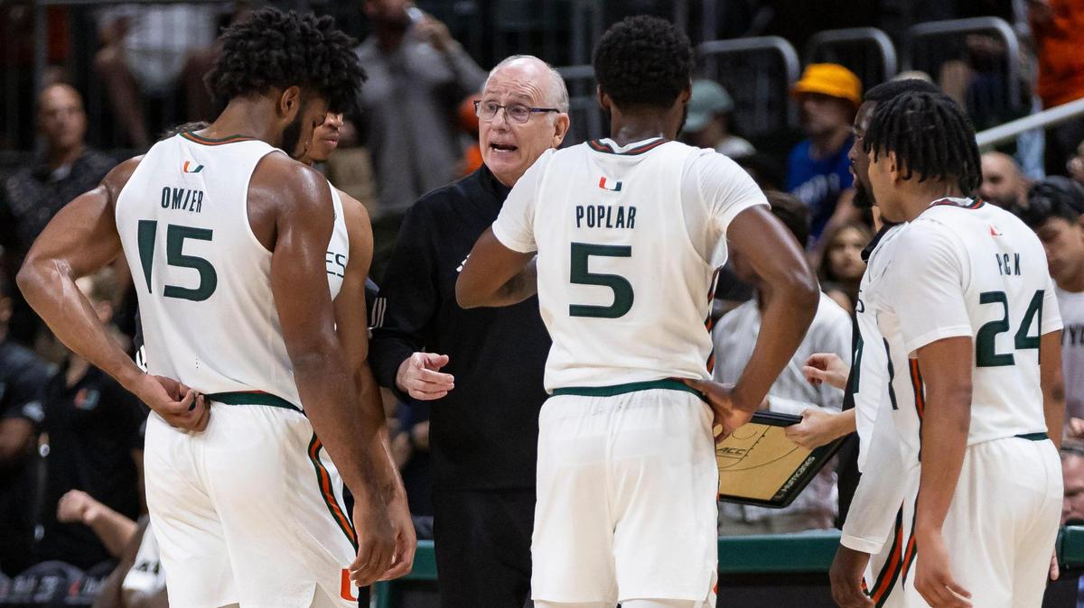 Miami Hurricanes head coach Jim Larrañaga talks to his players during a timeout against the Florida International Golden Panthers in the second half of an NCAA basketball game at the Watsco Center on Monday, Nov. 13, 2023, in Coral Gables, Fla.