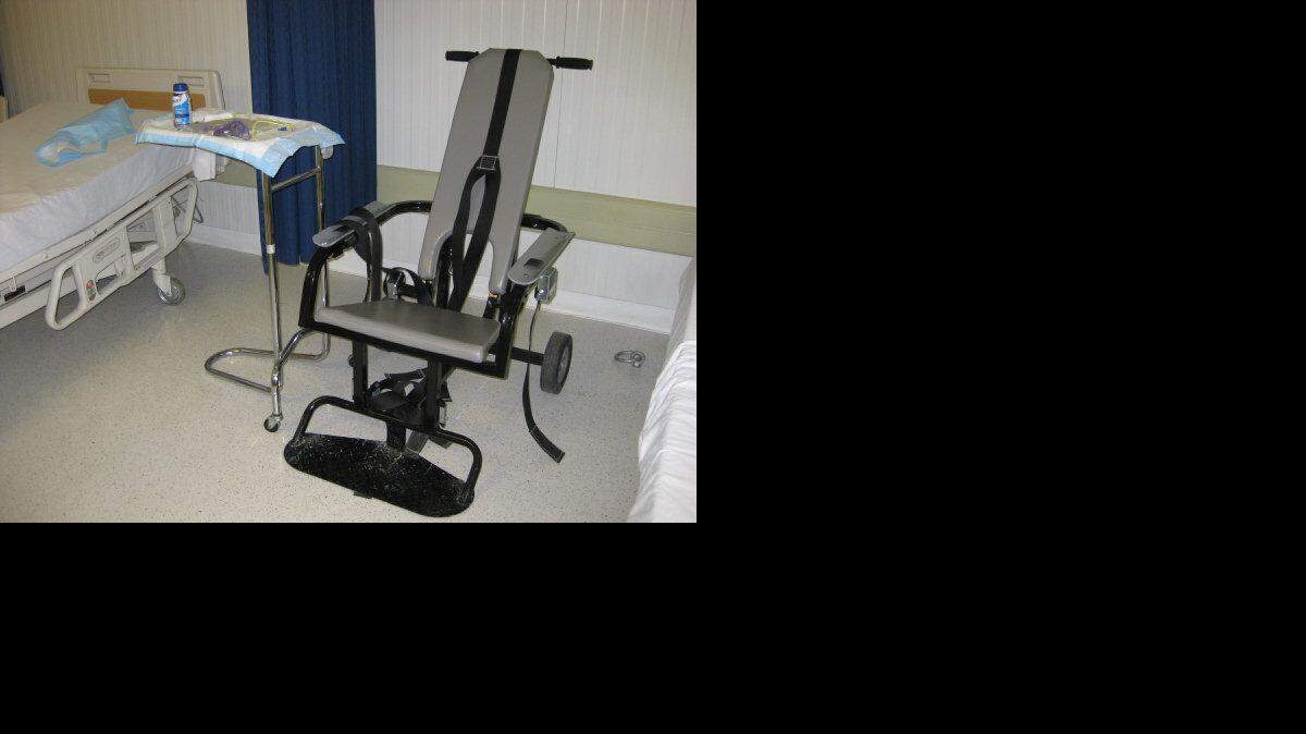 Captives who won't eat and are considered at risk are given up-to twice daily feedings of Ensure or other nutritional shakes, often while strapped into a restraint chair shown in this Thursday, March 21, 2013 display at the prison camps' hospital at the U.S. Navy base at Guantanamo Bay, Cuba. This photo was approved for release by the U.S. military under terms of access to the prison that let a soldier review each and every image and delete those that show too much or certain details.