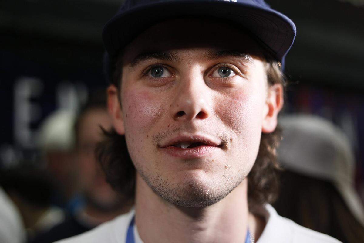Jack Hughes of the United States men’s hockey team arrives with teammates at E11EVEN Miami during a gold medal celebration on Monday, Feb. 23, 2026, in Miami, after returning from Milan following their victory over Canada at the 2026 Winter Olympics in Milan-Cortina, Italy.