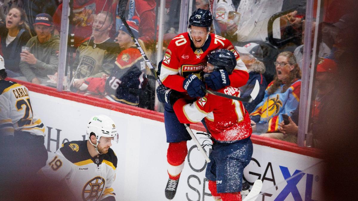 Florida Panthers left wing Jonah Gadjovich (12) celebrates his goal with assist from center Jesper Boqvist (70) during the second period of home opener of the Florida Panthers against the Boston Bruins on Tuesday, Oct. 8, 2024, at Amerant Bank Arena in Sunrise, Fla.