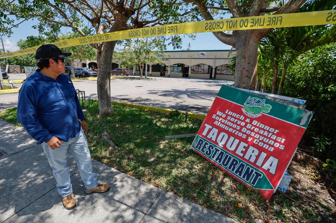 Restaurant owner, Neftali Coronado, looks towards his Taqueria Cinco Hermanos after a propane gas explosion injured ten people inside Palm Bakery, located in the same shopping strip at 941 West Palm Drive in Florida City, Florida, on Saturday, May 24, 2025.